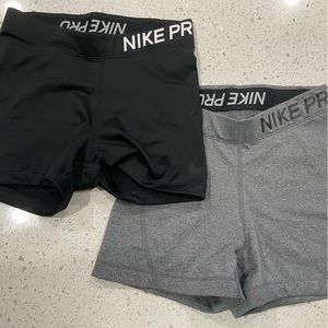 2 pairs Nike Pro women’s shorts XS black/grey
